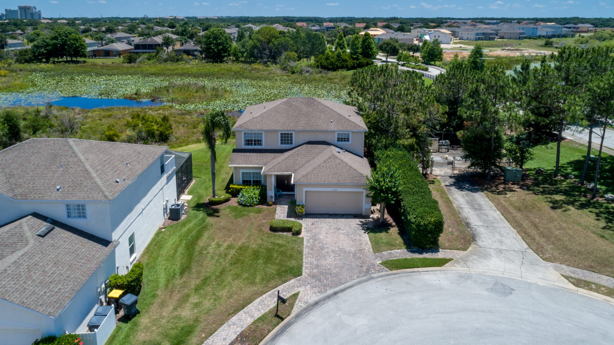 front of villa aerial view of community