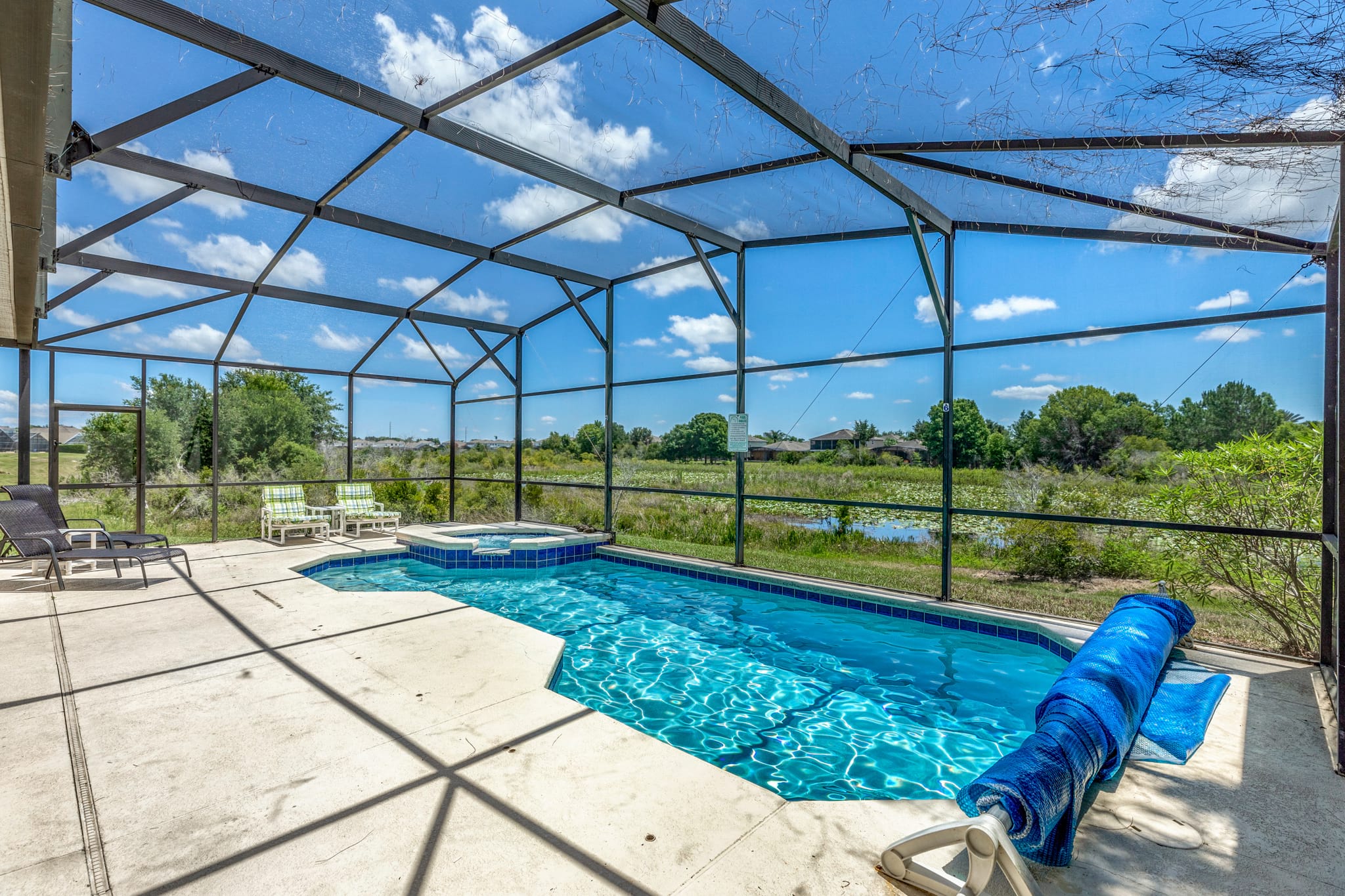 private pool over looking conservation lake