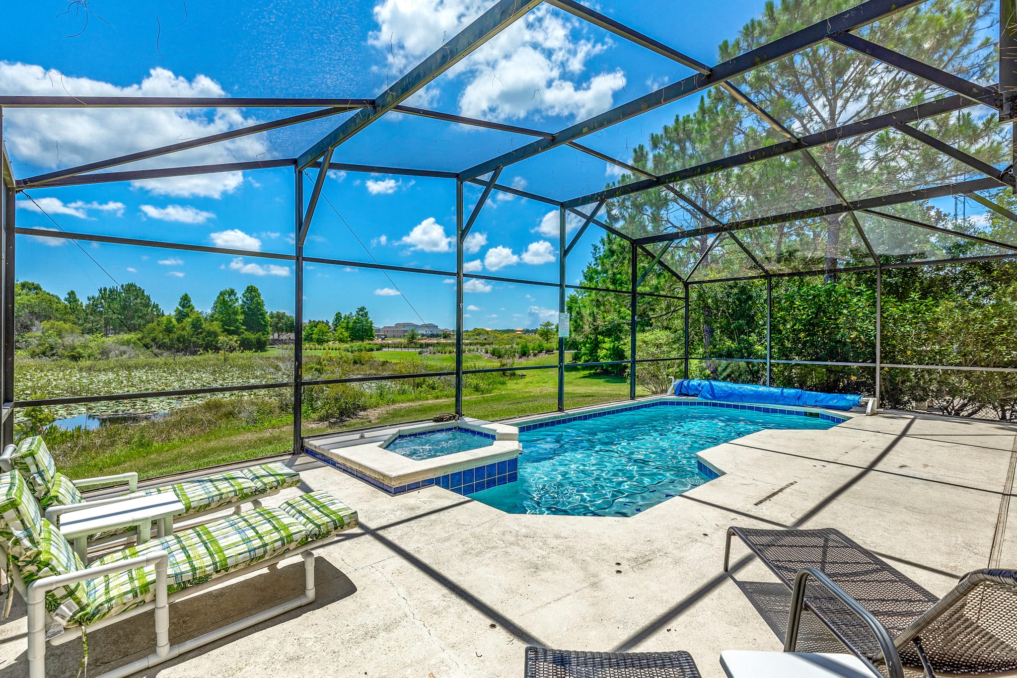 private pool with spa with uninterrupted lake views